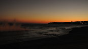 SX00738 Spray of waves at Tramore promenade during sunset (metal man towers).jpg